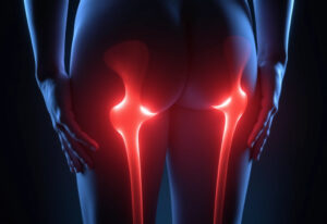 eine person die unter unerklärlichen muskelkaterähnlichen schmerzen in den beinen leidet visualisiert durch ein rotes leuchten auf den muskeln